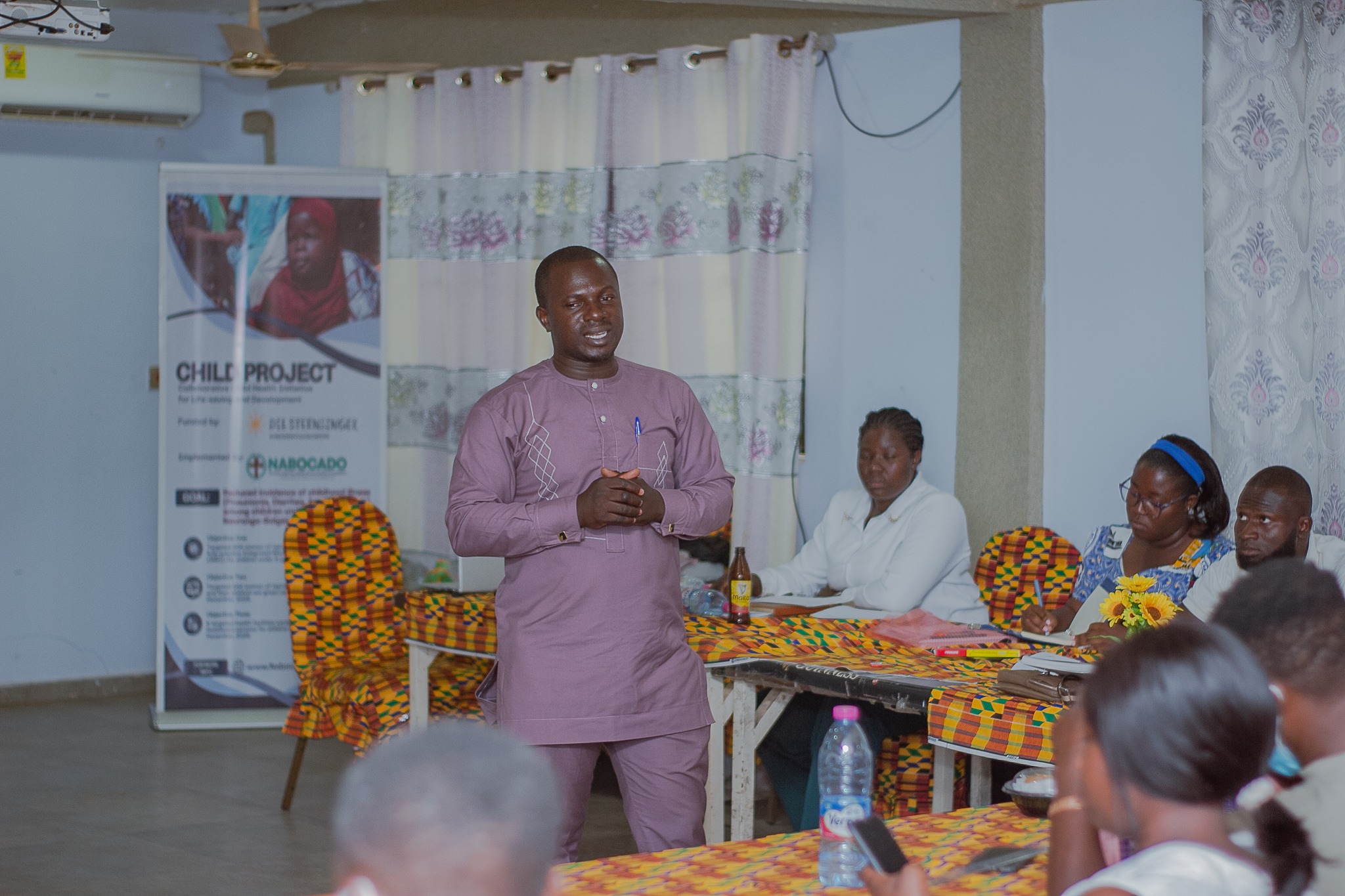 NABOCADO Health Director talking to participa