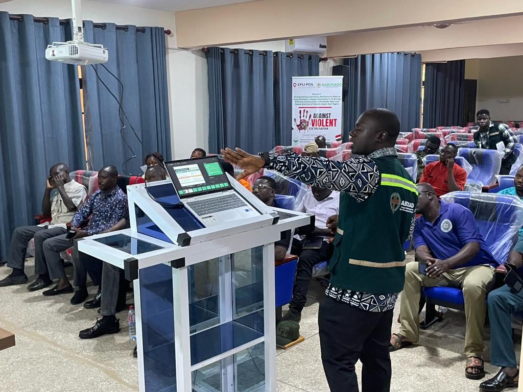 A NABOCADO officer presents the project to participants, including representatives of the security services