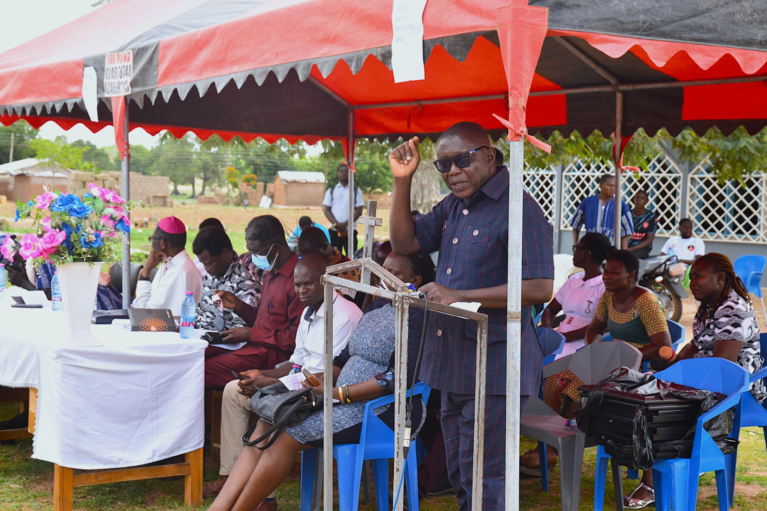 Dr. Bangu speaking at the event